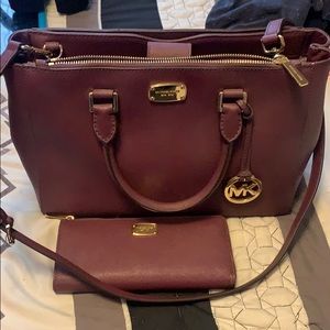 Authentic MIchael Kors handbag and wallet plum